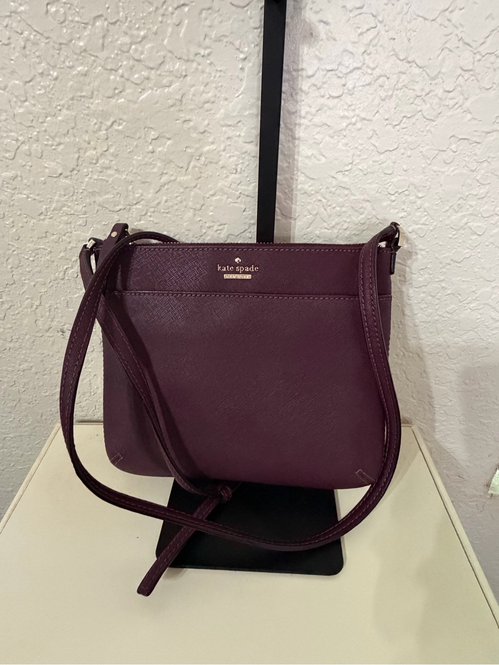 kate spade plum crossbody bag with gold logo